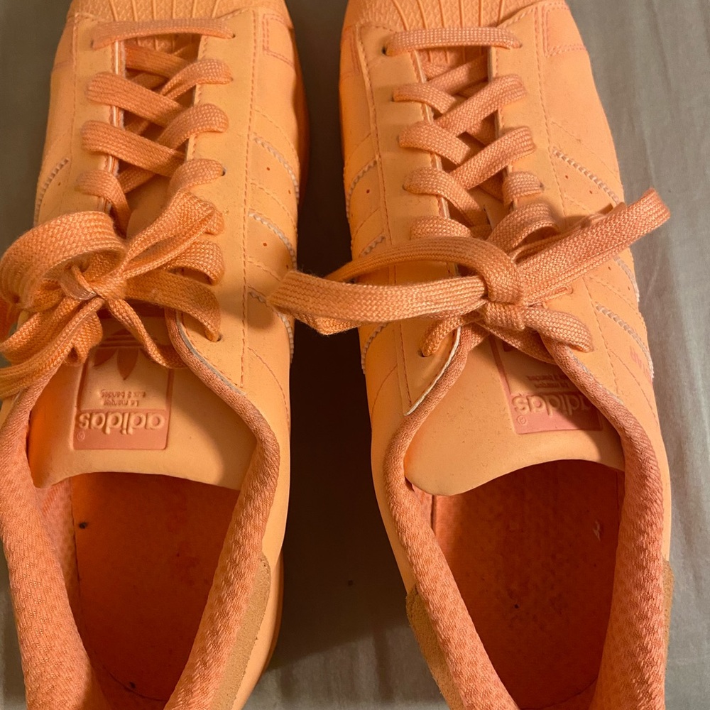 Brand new fluorescent orange Adidas, men’s size 10